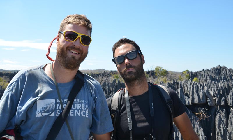 Image of Museum curators Ian Miller and Joe Sertich above Tsingy de Bemaraha National Park, a stunning geological wonder filled with lemurs, chameleons, and birds.